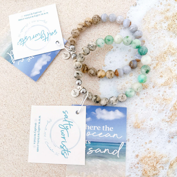 Aqua tides or beachy blues with sandy jaspers