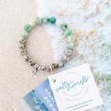 Aqua tides or beachy blues with sandy jaspers