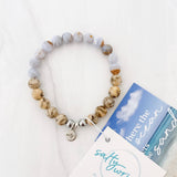 Aqua tides or beachy blues with sandy jaspers