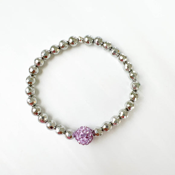 Purple sparkle with faceted hematite