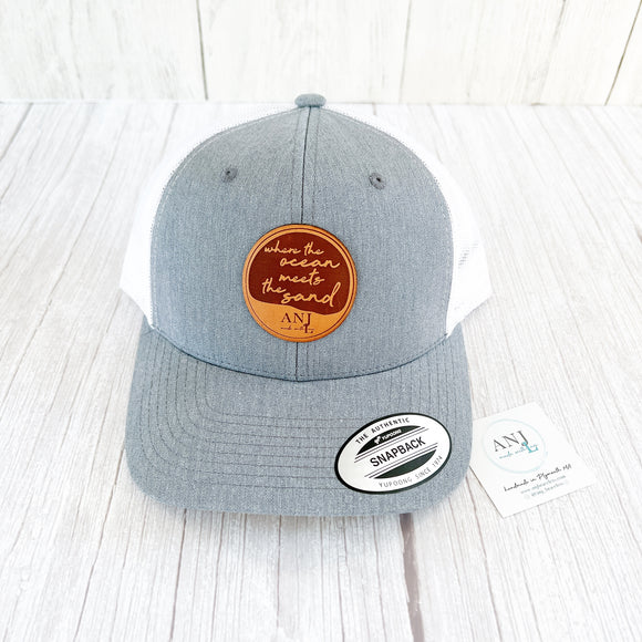 Where the ocean meets the sand leather patch hat